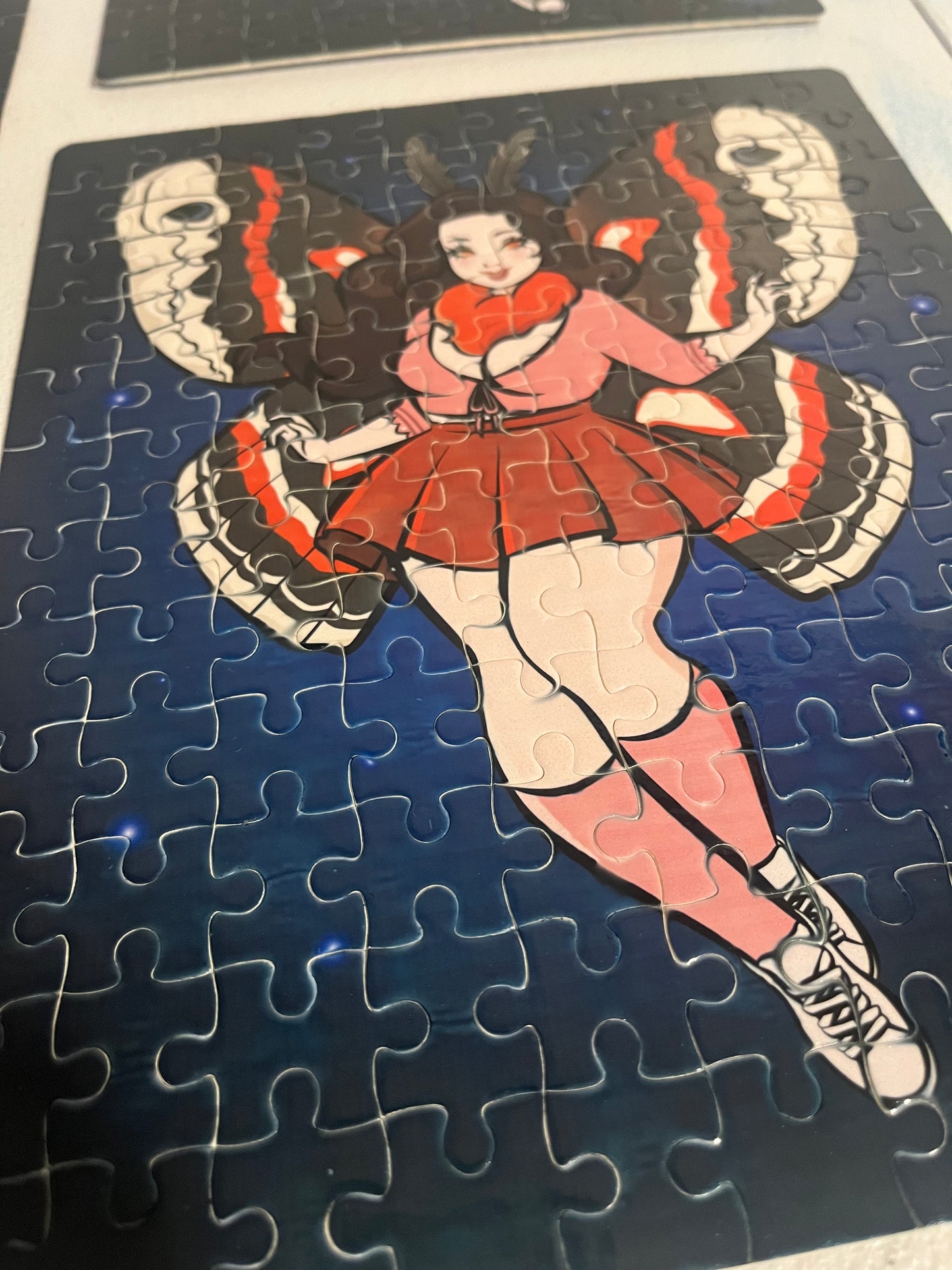 Mesmerized by the Mothwoman Puzzle